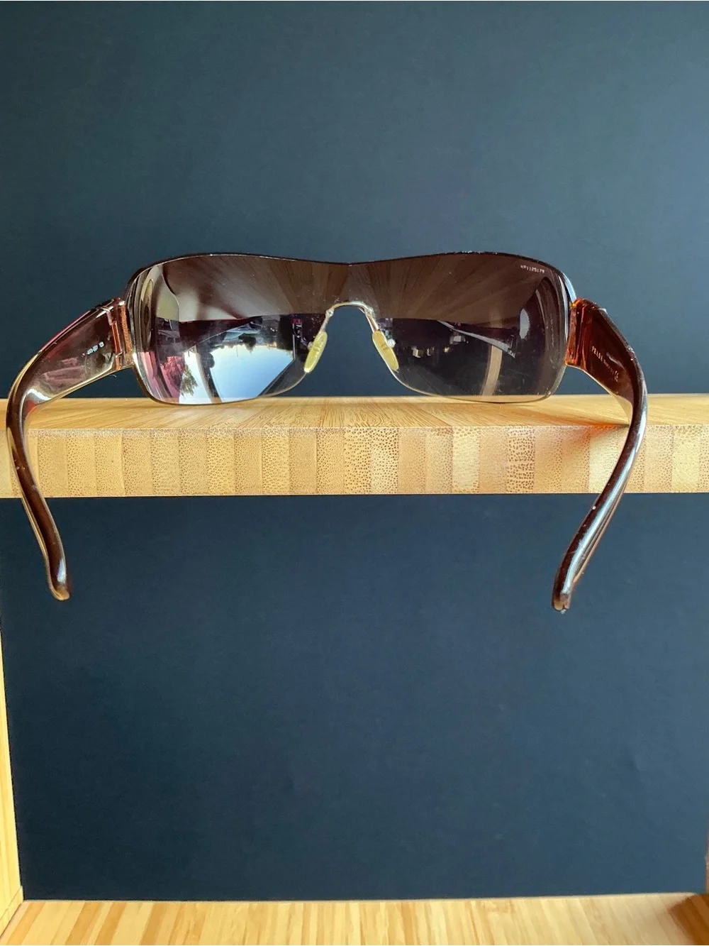 Prada  wrap-around shield sunglasses brown sunglasses with red accents